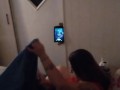White cute milf in night dress smoking and watching TV