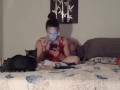 White milf smoking while watching videos on her phone