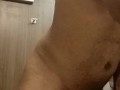 Stroking my big dick in the hotel bathroom while housekeeping is in the other room. 