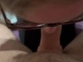 young with glasses gives a blowjob without hands