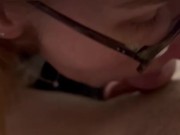 young with glasses gives a blowjob without hands