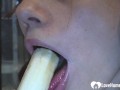 Brunette babe show's her sucking skills on banana