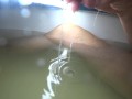 Massive eruption of sperm underwater. Masturbation in the bathroom
