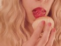 Blonde Eats a Cupcake with Pink Frosting
