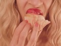 Blonde Eats a Cupcake with Pink Frosting