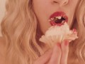Blonde Eats a Cupcake with Pink Frosting