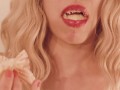 Blonde Eats a Cupcake with Pink Frosting