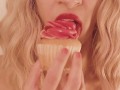 Blonde Eats a Cupcake with Pink Frosting