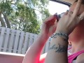 Cute girl smoking in truck 
