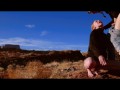 Cock sucking bound submissive revels in ass whipping and rimjob action in red rocky landscape under the hot sun