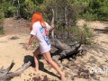 redhead milf pissing in the woods standing on a log 4K 60fps
