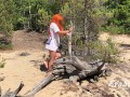 redhead milf pissing in the woods standing on a log 4K 60fps