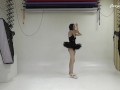 Russian brunette acrobat stretching her sexy long legs
