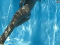 Watch her swim naked underwater in the pool