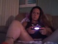 Filming up Milf in high heels wearing mini dress while she plays fortnite