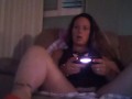 Filming up Milf in high heels wearing mini dress while she plays fortnite