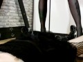 Shoes fetish. Dominatrix Nika tramples the body of her feminized slave with her heels