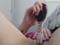 punching a brush in the pussy