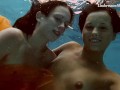 Mega hot and wet lesbos swimming and stripping