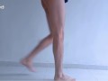 Long legs and sexy feet doing squats while stripping