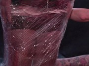 Two amazing Mistress put the maid in stocks, insert a bougie into his urethra and wrap it with cling