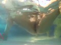 Elegant and flexible babe, swimming underwater in the outdoor swimming pool. 3 2