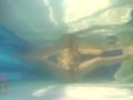 Elegant and flexible babe, swimming underwater in the outdoor swimming pool. 3 2