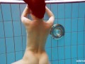 Cute teen Deniska swimming naked in the pool