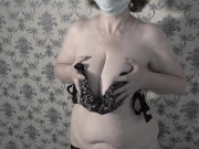 Mature BBW MILF gets naked and shows her big saggy soft natural tits.