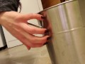 Pissing into a Metal Bucket