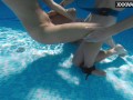 She gives up in orgasms in the swimming pool with big cock
