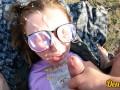 cutie in glasses and jacket has sex in nature and gets a lot of cum on her face