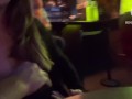 Showing her beautiful breasts in a pub