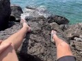 Gorgeous readhed fucked on the beach between the rocks