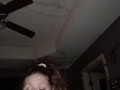 wife playing with toy and sucking