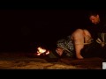 Horny bound BDSM lover in night time anal pleasure scene by the crackling fire pit for sub beauty