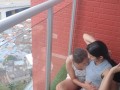 I fuck my stepbrother's girlfriend on the balcony of the apartment.