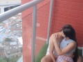I fuck my stepbrother's girlfriend on the balcony of the apartment.