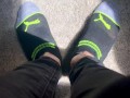 Two socked feet rub against one another - SFW