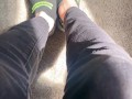 Two socked feet rub against one another - SFW