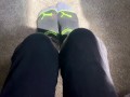 Two socked feet rub against one another - SFW