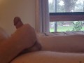 Fat hubby jerking off in front of an open window