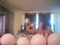 Milf with extreme long hair popping balloons and smoking cigarettes while filming up her own skirt