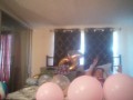Milf with extreme long hair popping balloons and smoking cigarettes while filming up her own skirt