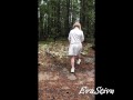 pissing standing in the forest by the road