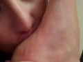 Sexy girl sniffing socks and feet then suckin toes and licking soles