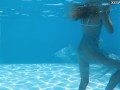 Captivating Bonnie Dolce swimming naked