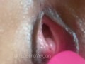 CLOSE UP of a woman putting a dildo in her pussy!