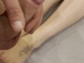 I come to jerk off on her feet and cum on her small tits while she watches TV