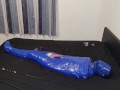Femdom Goddess whips balls of mummified slave